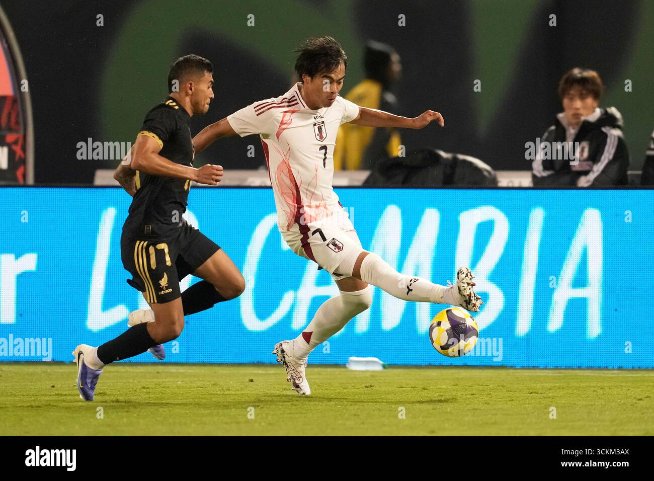 Japan S Kauro Mitoma Right Kicks The Ball In Front Of Mexico S Orbel N Pineda During An Japans Kauro Mitoma Right Kicks The Ball In Front Of Mexicos Orbeln Pineda During An Friendly Soccer Game In Oakland Calif Saturday Sept 6 2025 Ap Photojeff Chiu 3CKM3AX