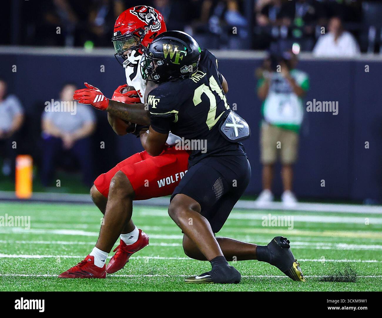 September 11,2025: NC State wide receiver Noah Rogers (5) gets tackled ...