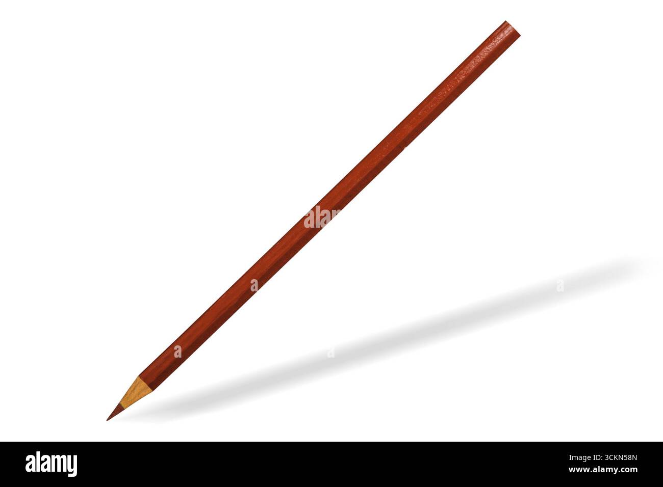 Red wooden sharpened pencil on white background. Isolated. Stock Photo