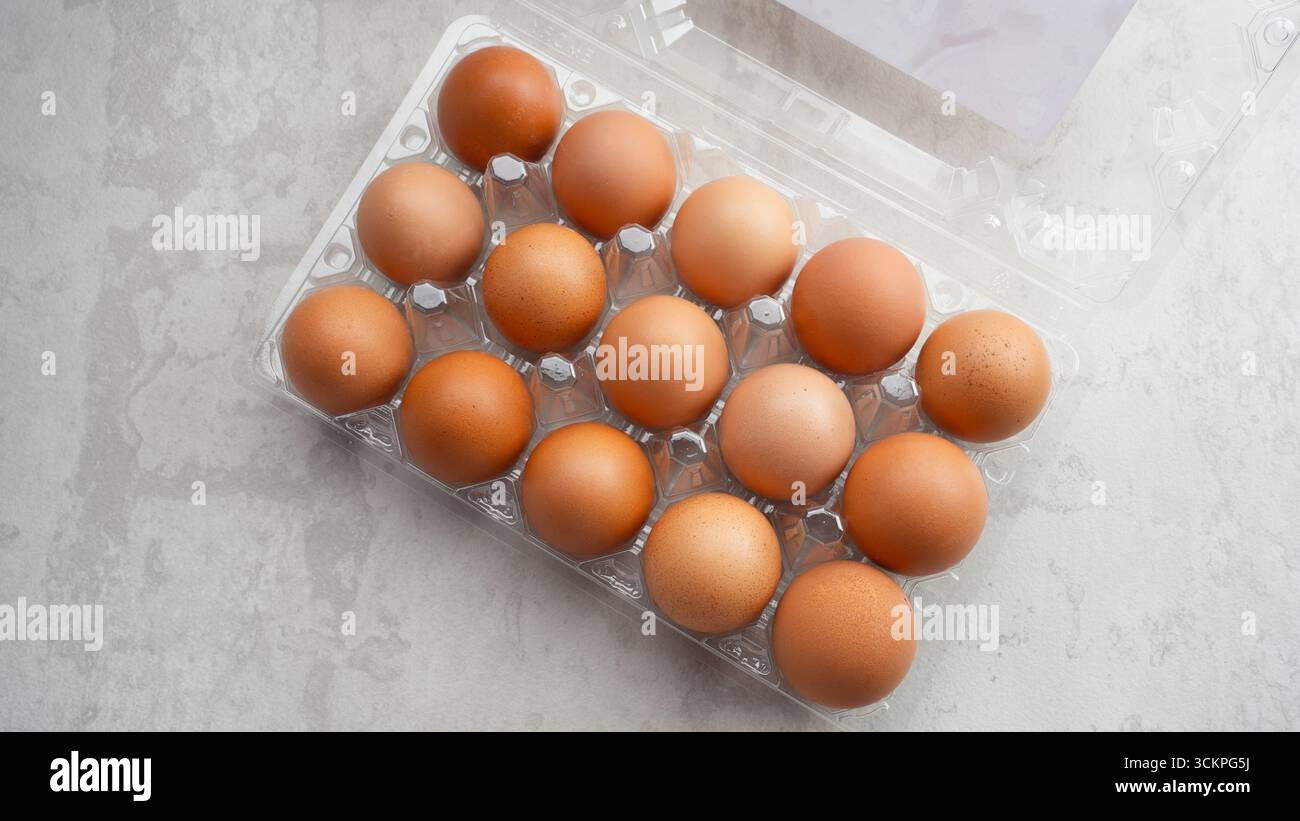 Organic chicken eggs in plastic packaging Stock Photo