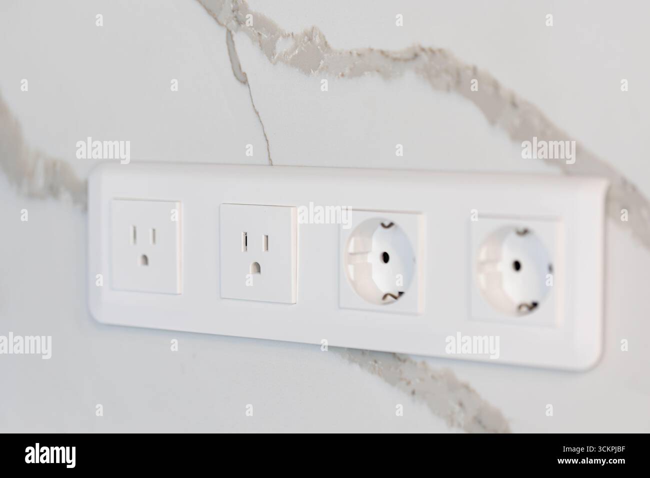 Universal power outlets. Modern interior. Marble wall design. Stock Photo