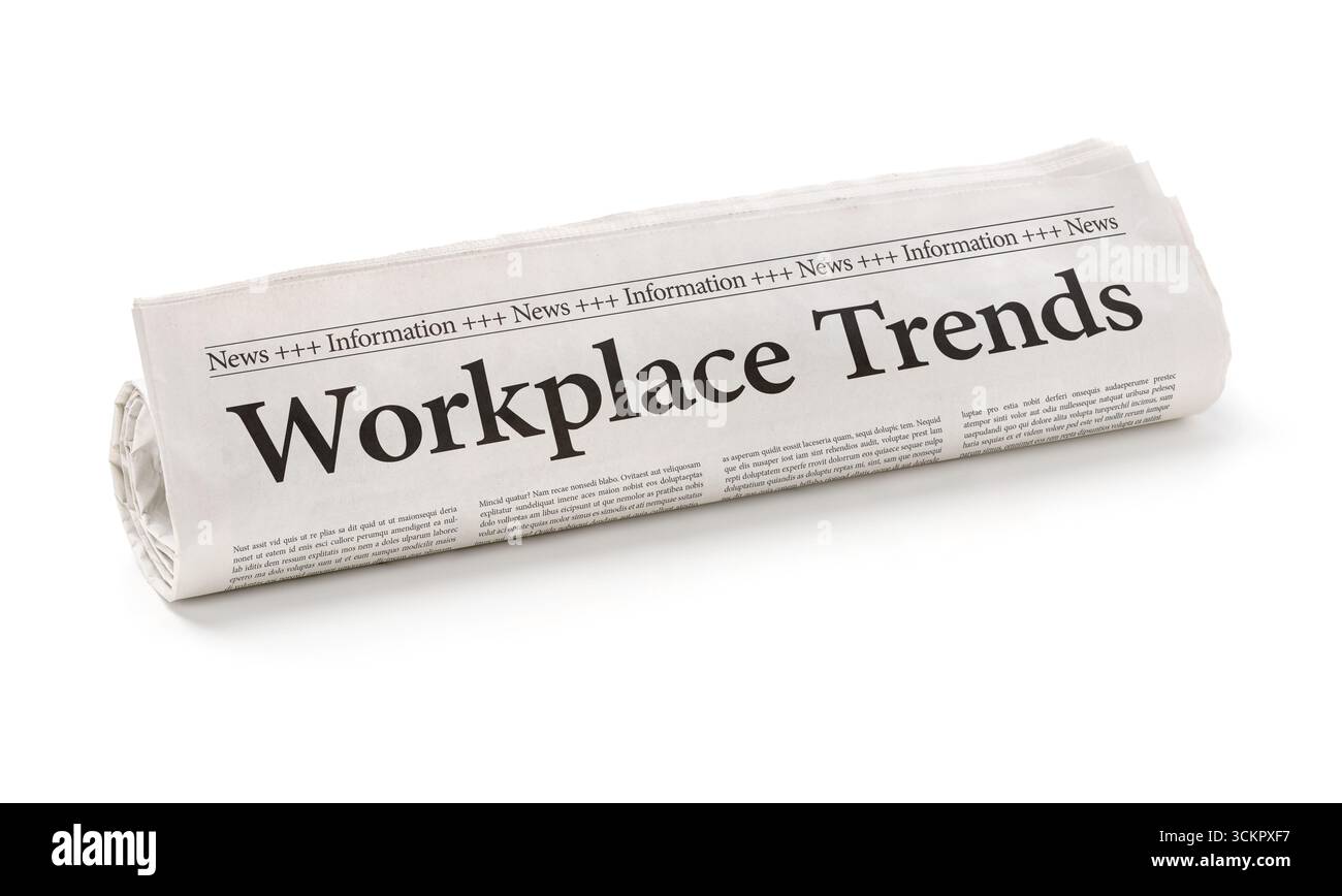 Rolled newspaper with the headline Workplace Trends Stock Photo