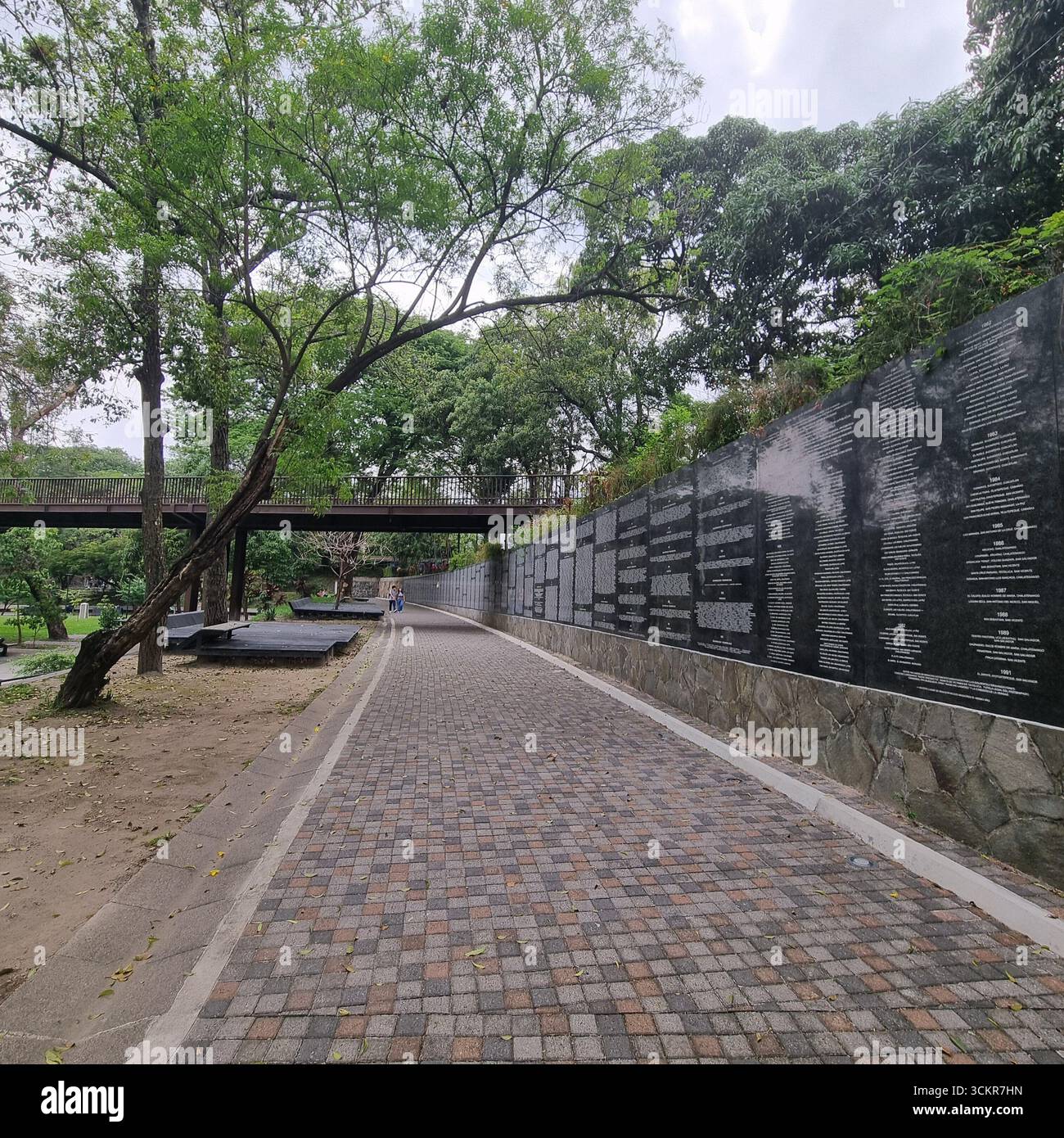 The monument of Memory and Truth - The names of the dead and disappeared souls of the civil war in El Salvador are carved in stone - Smartphone Captured Stock Image