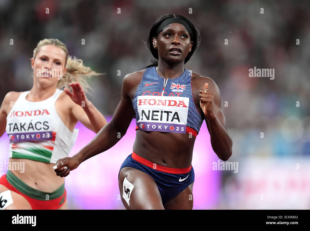 Daryll Neita of Great Britain (right) finishes first in heat 5 of the ...