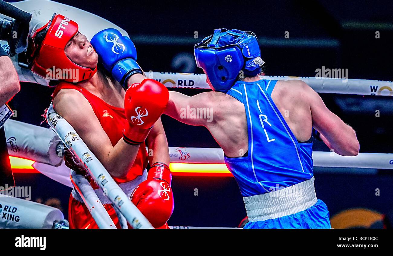 Ireland's Aoife O'Rourke (Blue) and China's Lina Wang (Red) fight in ...