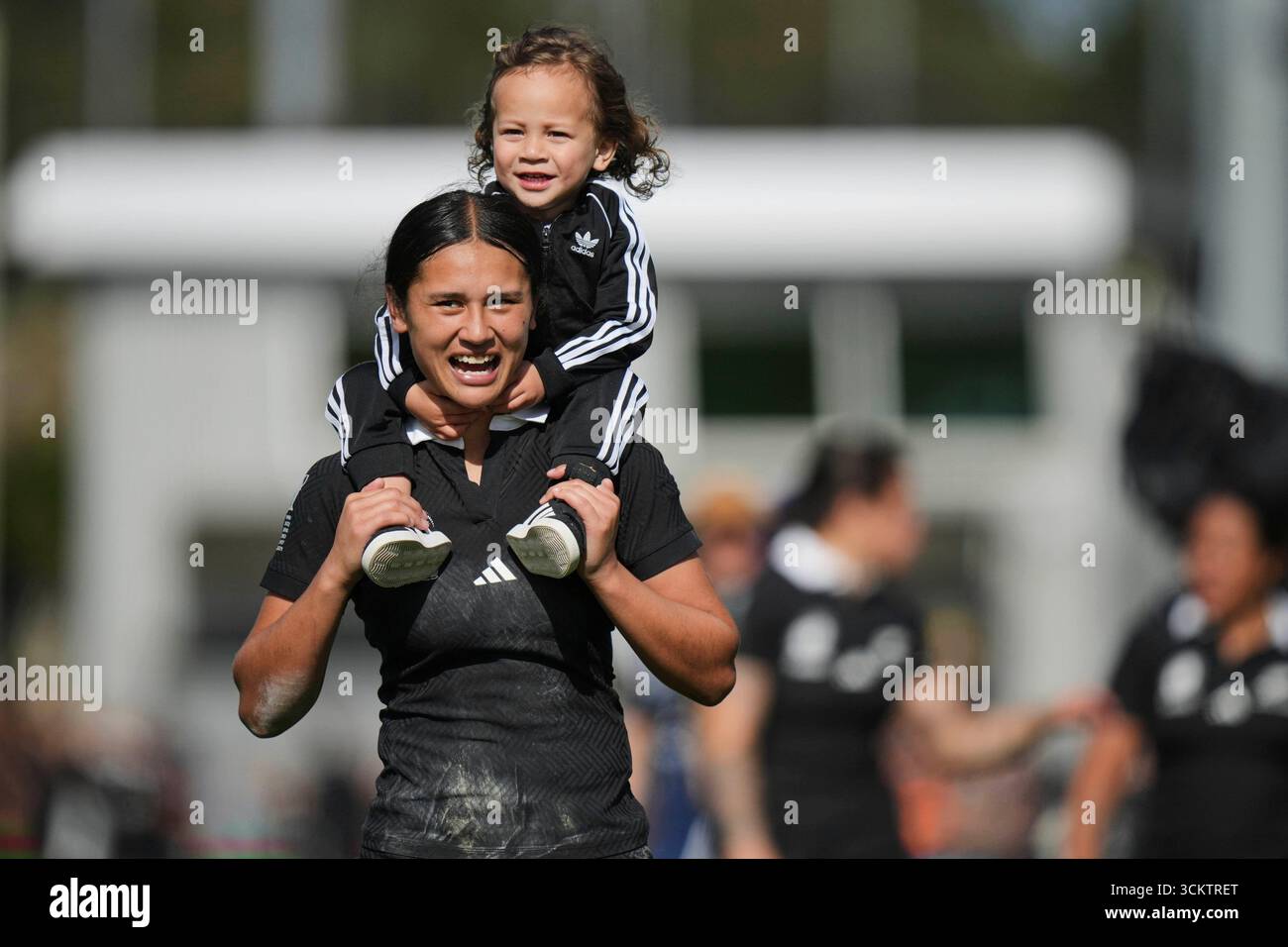 Braxton Rugby New Zealand's Braxton Sorensen-McGee holds a Childs as she celebrate ...