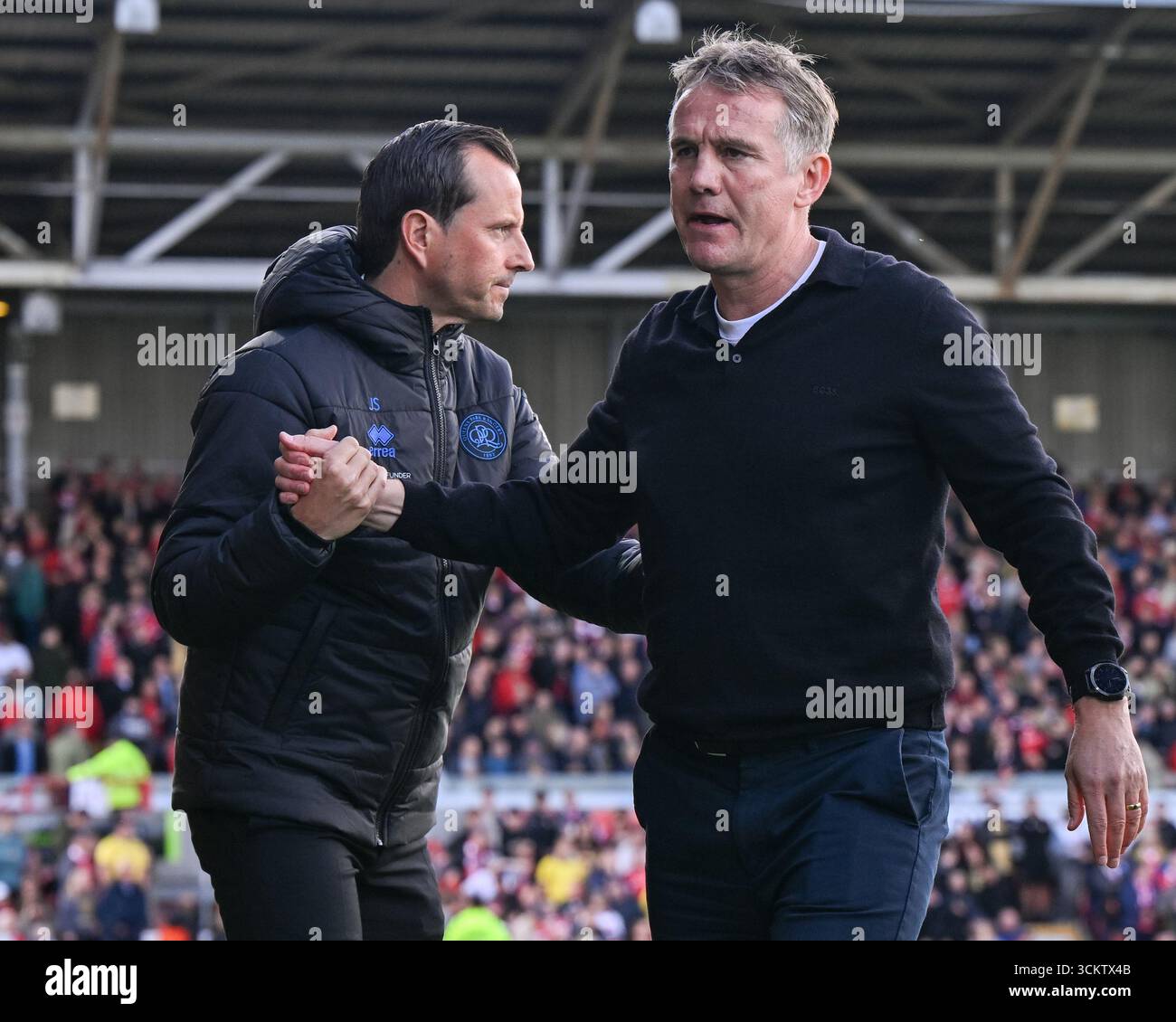 Queens Park Rangers manager Julien Stephan (left) and Wrexham manager ...