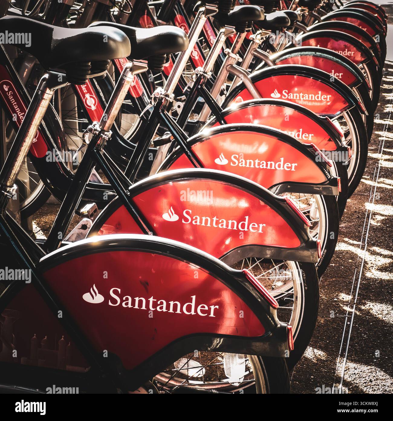A row of rental bicycles in London. "Boris Bikes" is the popular name for Santander Cycles, a public bicycle hire scheme in London, launched in 2010 u - Smartphone Captured Stock Image