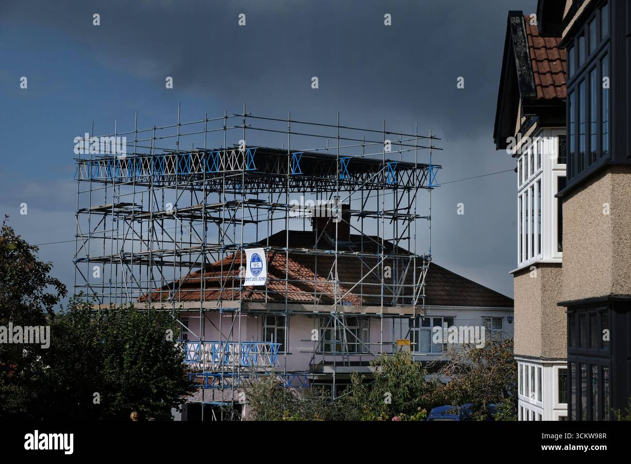 Scaffolding for a house loft conversion viewed from another house. Stock Photo