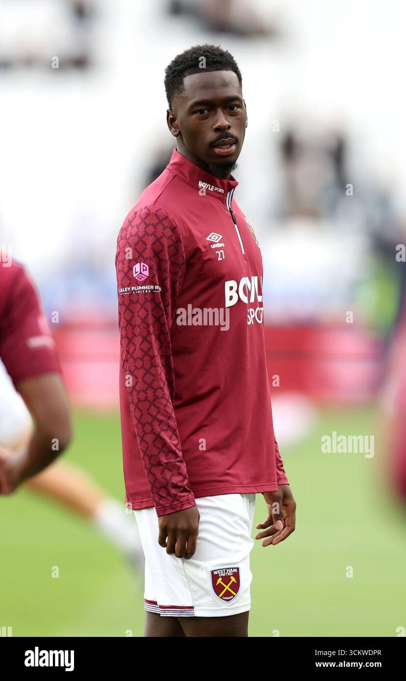 West Ham United's Soungoutou Magassa warming up before the Premier ...
