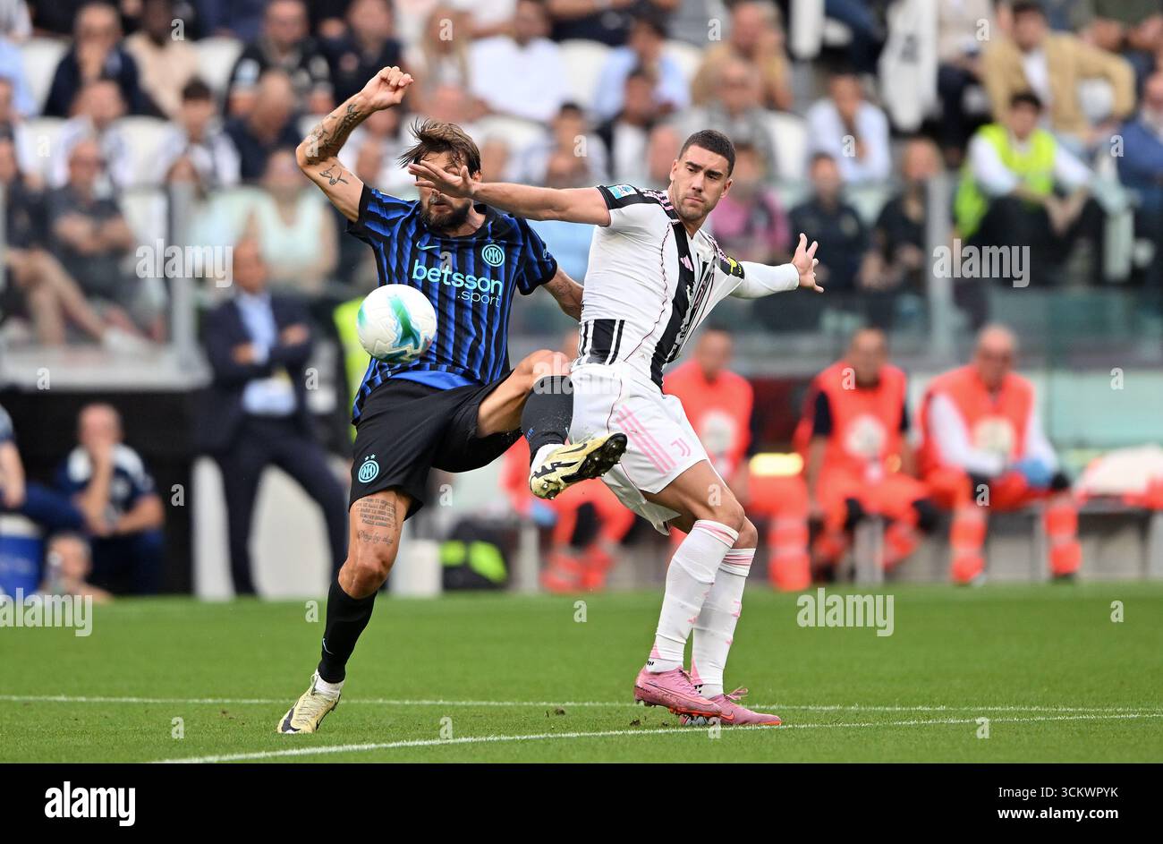 Dusan Vlahovic of Juventus FC challenged by Francesco Acerbi of FC ...