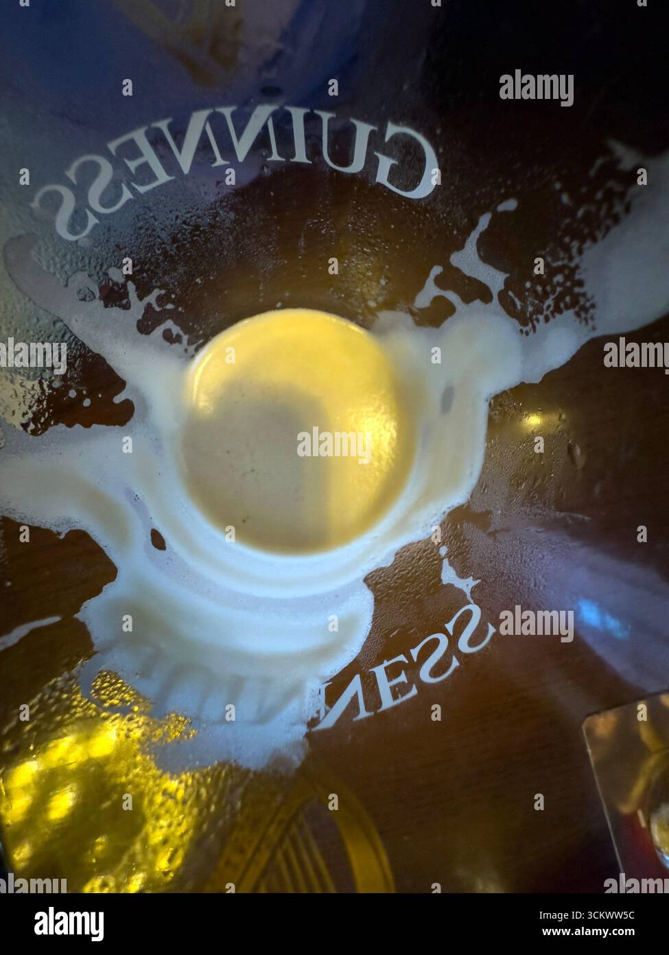 Empty Pint of Guinness beer in The Oak pub, Parliament St, Temple Bar,  Dublin, Ireland - Smartphone Captured Stock Image