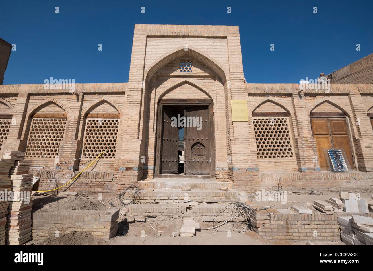 Crunbling Building The facade of a crumbling building is restored in advance of the 2026 ...