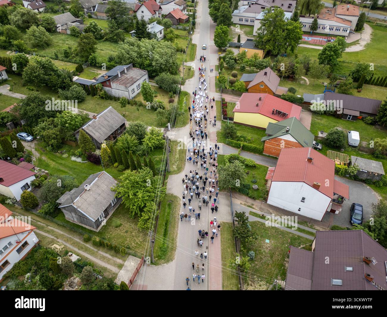 Gwizdaly, Poland - June 19, 2025: Procession after mass during Feast of Corpus Christi in Gwizdaly village, Masovia region of Poland Stock Photo