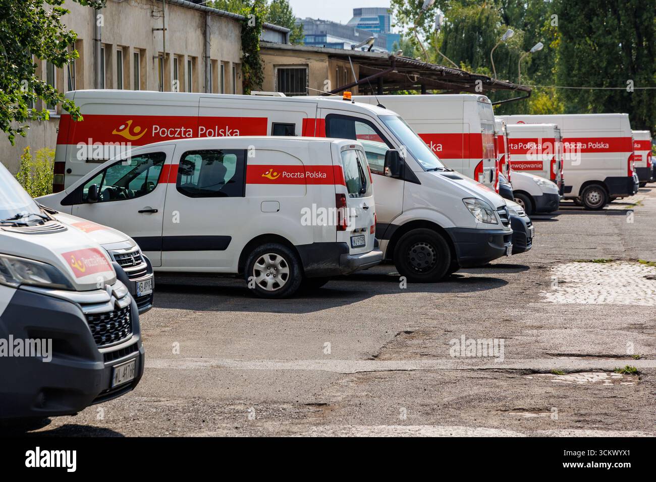 Warsaw, Poland - August 3, 2025: Vehicles of Polish Post, the state postal administration of Poland Stock Photo