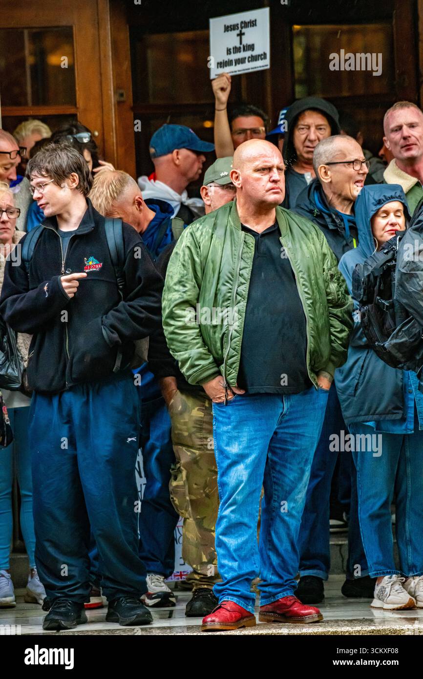People cower from the rain in London, UK. 13 September, 2025 for the ...