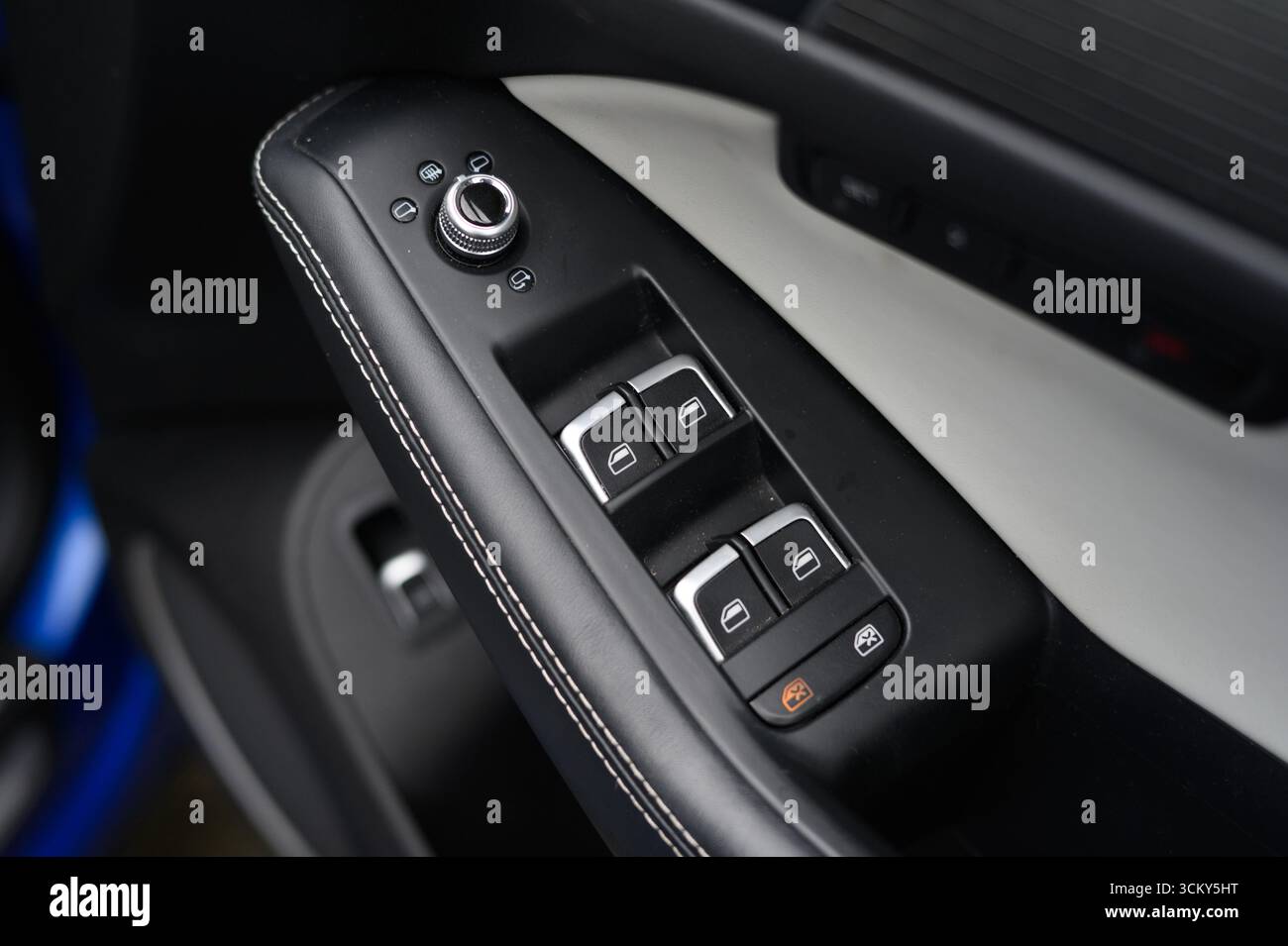 electric window control switches inside a modern car, focusing on the ...
