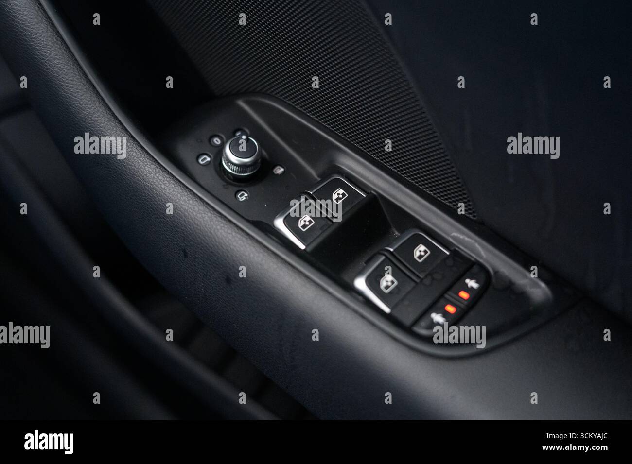 electric window control switches inside a modern car, focusing on the ...