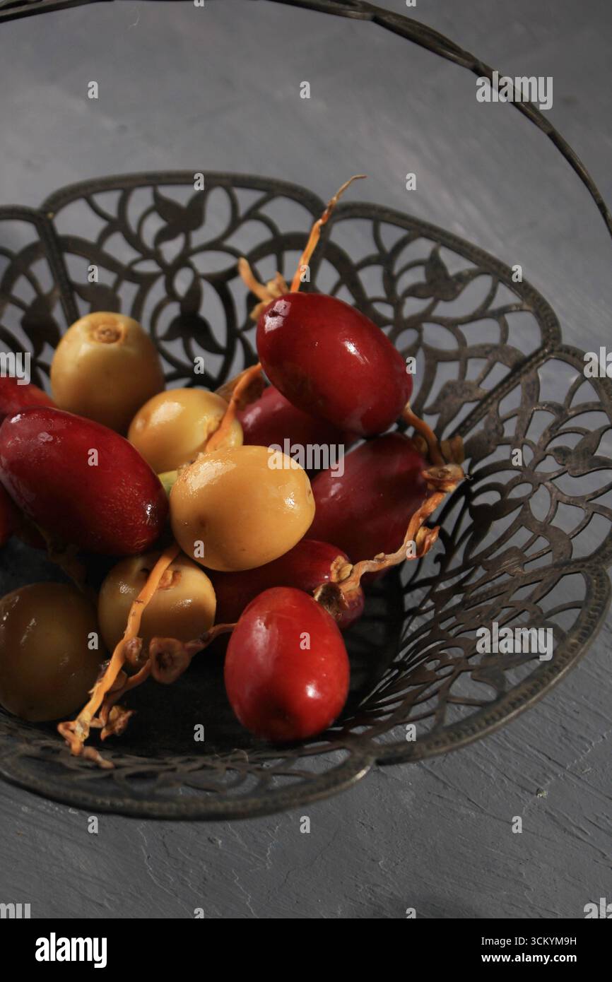 Yellow and Red Fresh Raw Dates Stock Photo