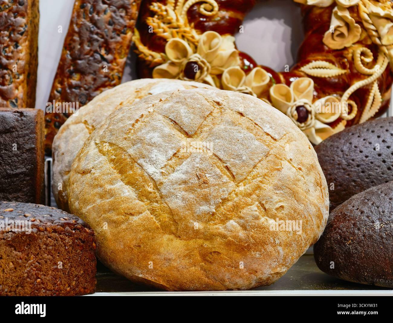 Traditional bread and baked goods displayed at a local festival ...
