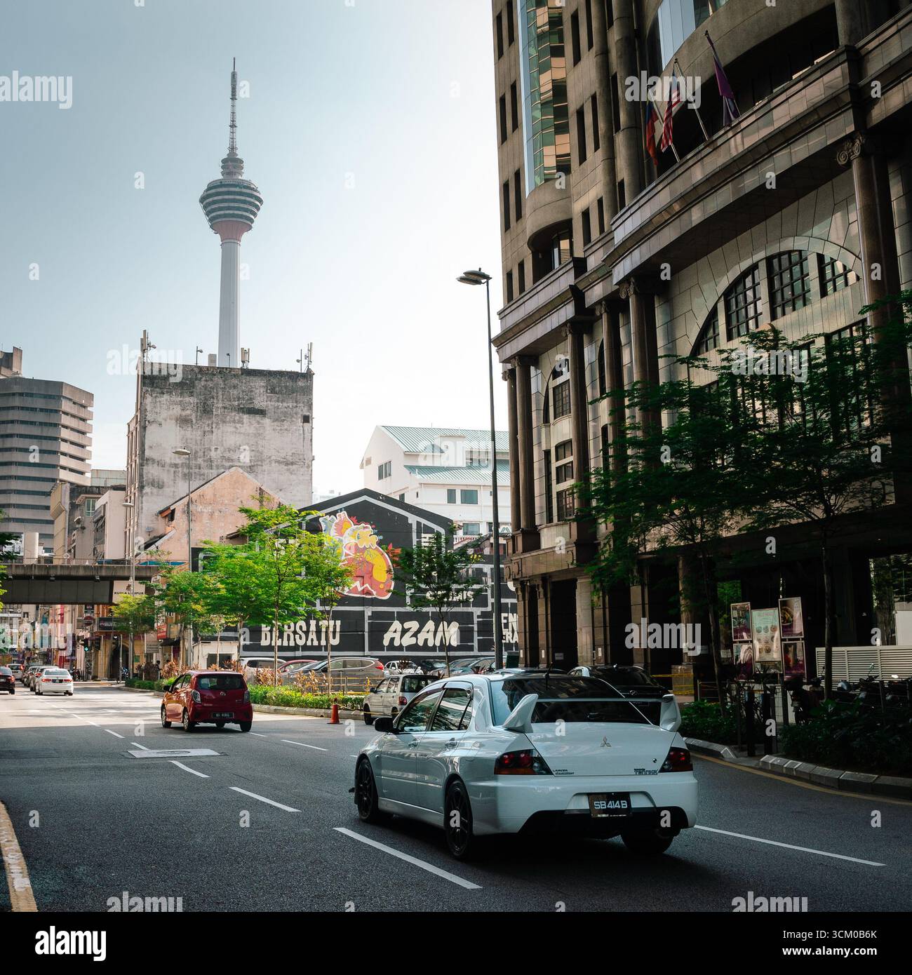 White Mitsubishi Evo 9 on an urban street Stock Photo