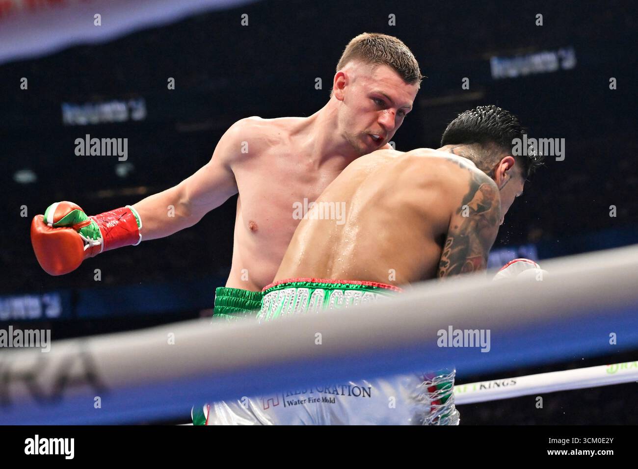 Callum Walsh, left, throws a punch at Fernando Vargas Jr. during a ...