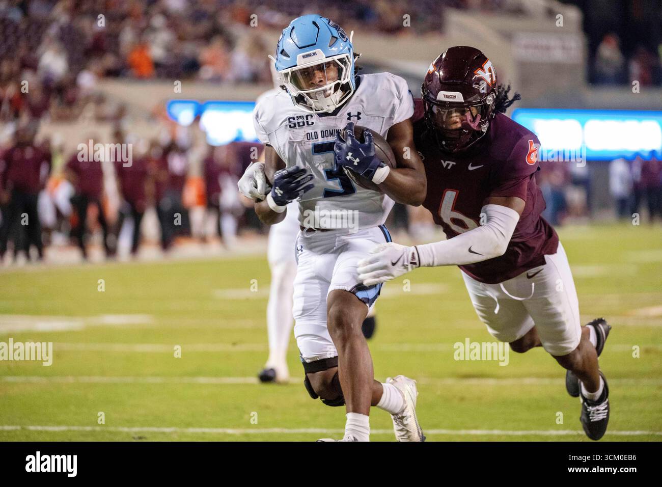Old Dominion running back Devin Roche (3) runs for a touchdown against ...