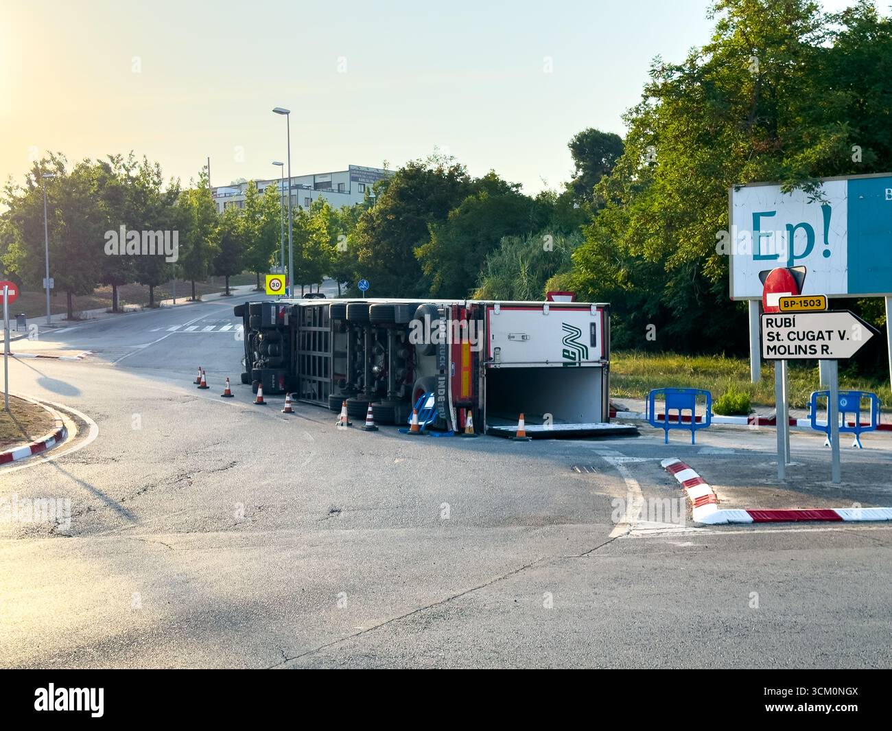 Rubi, Barcelona, Spain. August 9, 2025. An overturned truck causes a traffic jam on a suburban road. The accident illustrates transportation problems - Smartphone Captured Stock Image
