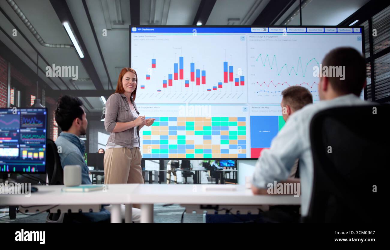 African American Stock Analyst Analyzing Data On Computer At Night. Stock Photo