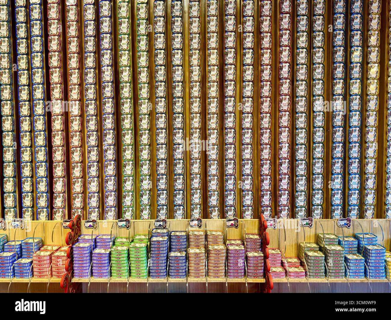 The Fantastic World of Portuguese Sardines retail shop display of canned sardines and other varieties of fish - Smartphone Captured Stock Image