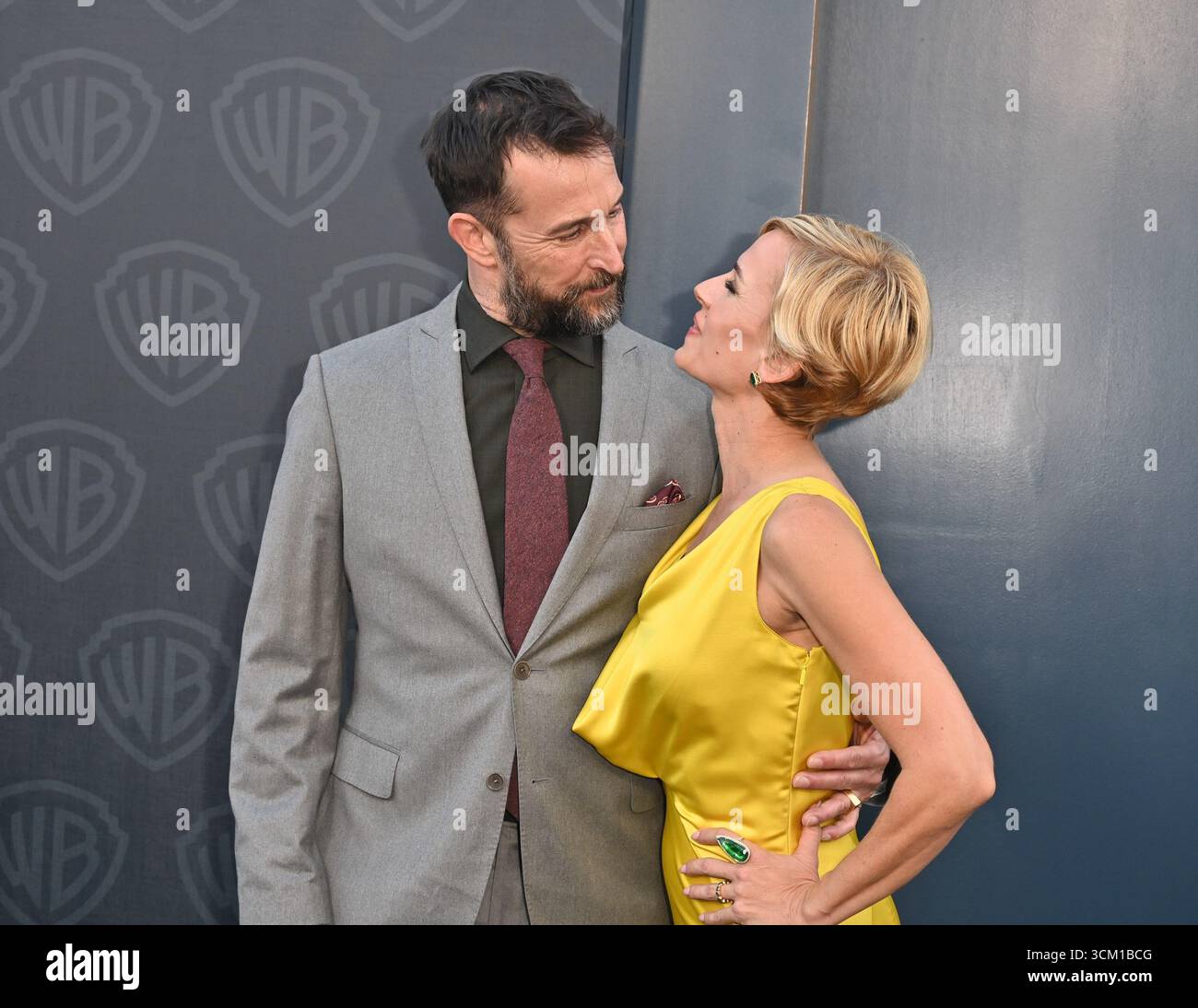 Noah Wyle, Sara Wells at arrivals for Warner Bros. Television Group