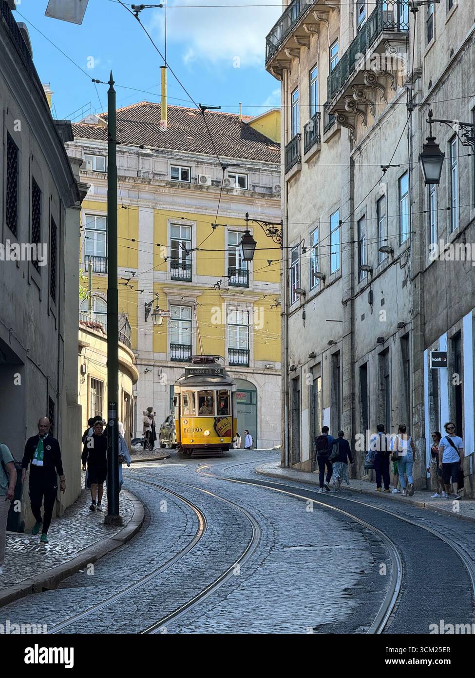 Public transport tram in Baixa historical centre of Lisbon Portugal - Smartphone Captured Stock Image
