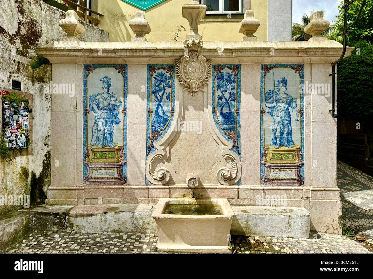 Fountain Fonte da Pipa displaying traditional blue Azulejos tiles in historical centre of Sintra Portugal - Smartphone Captured Stock Image