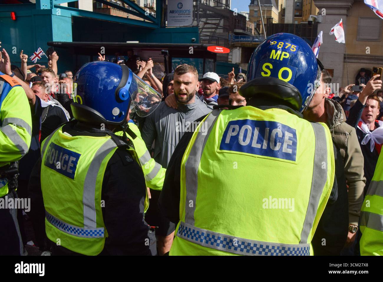 London, UK. 13th September 2025. Riot police keep far-right protesters ...