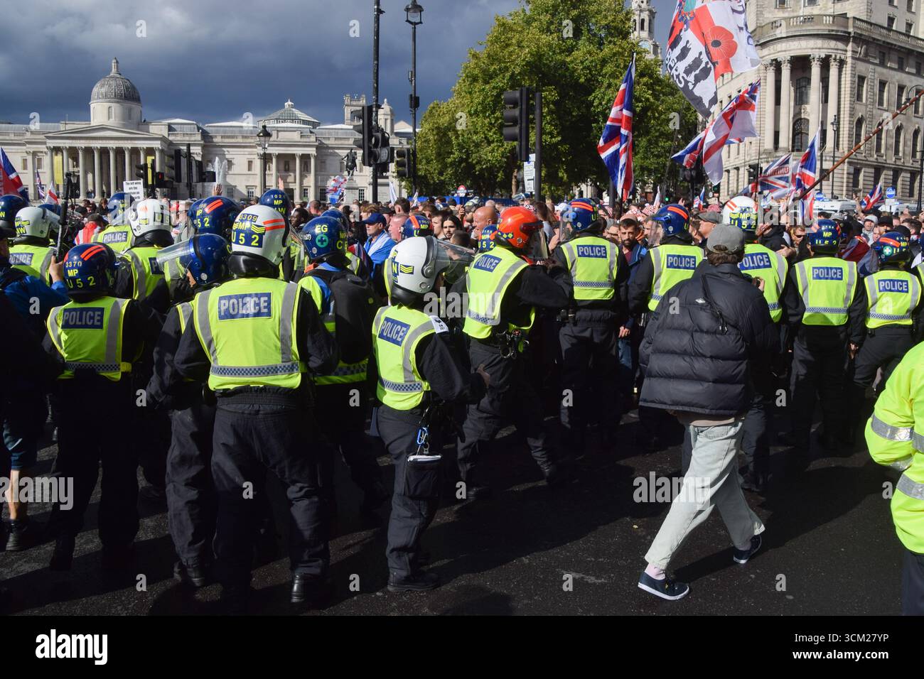 London, UK. 13th September 2025. Riot police keep far-right protesters ...
