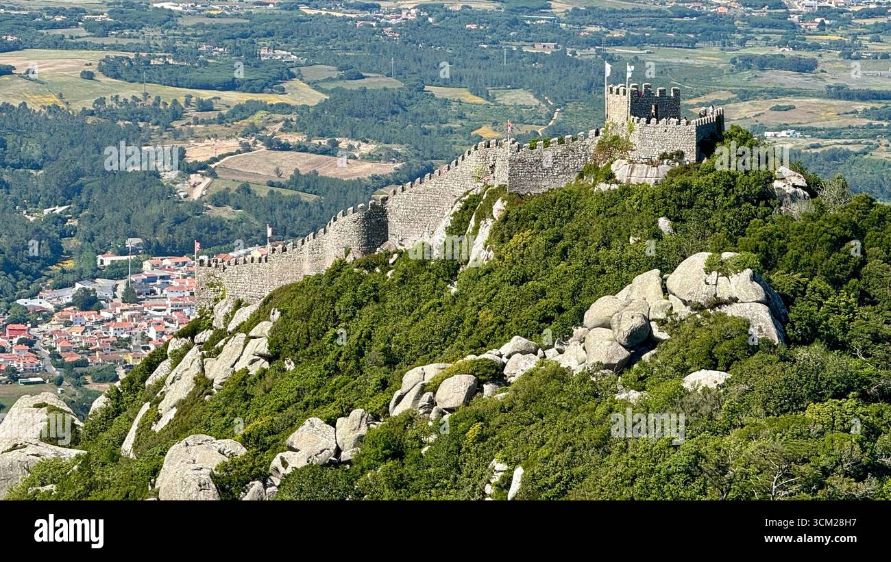 The Castle of the Moors, hilltop medieval castle in Sintra Mountains in Sintra-Cascais Natural Park Portugal - Smartphone Captured Stock Image