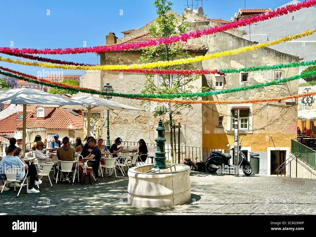 Alfresco dining in Alfama Lisbon Portugal - Smartphone Captured Stock Image