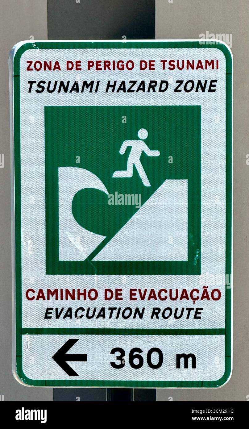 Sign warning of Tsunami hazard in Lisbon Portugal - Smartphone Captured Stock Image