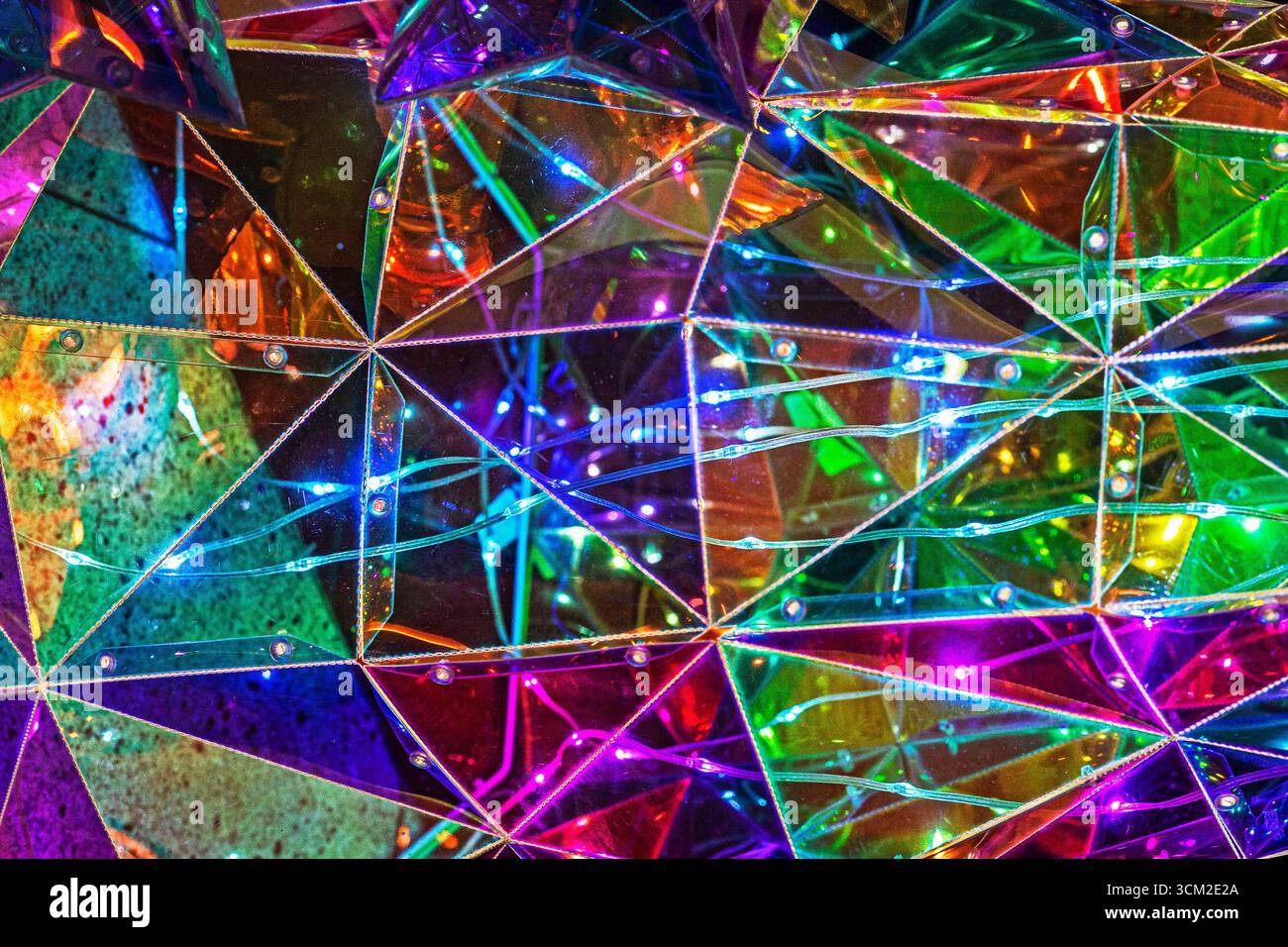 stylish surface made of pieces of multi-colored transparent glass. Interior trends Stock Photo