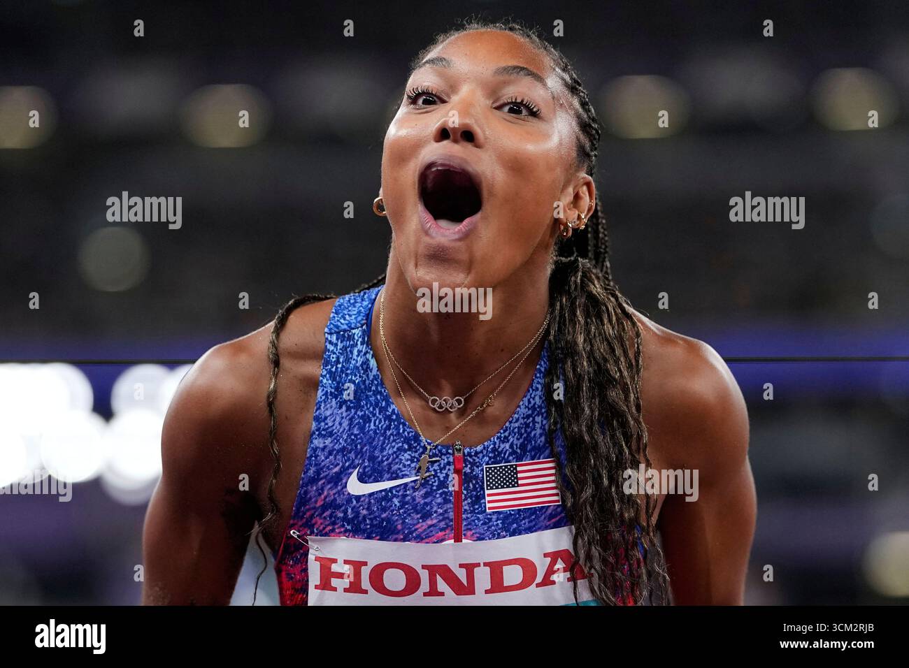 United States' Tara DavisWoodhall reacts after winning the gold medal