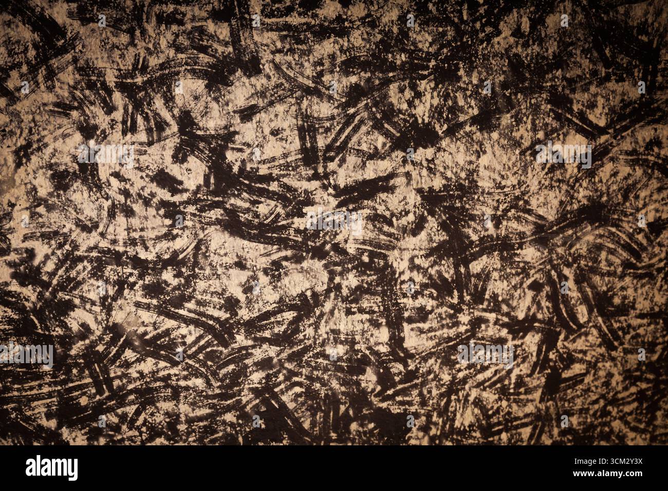 Abstract black scuff marks on a white surface. Stock Photo
