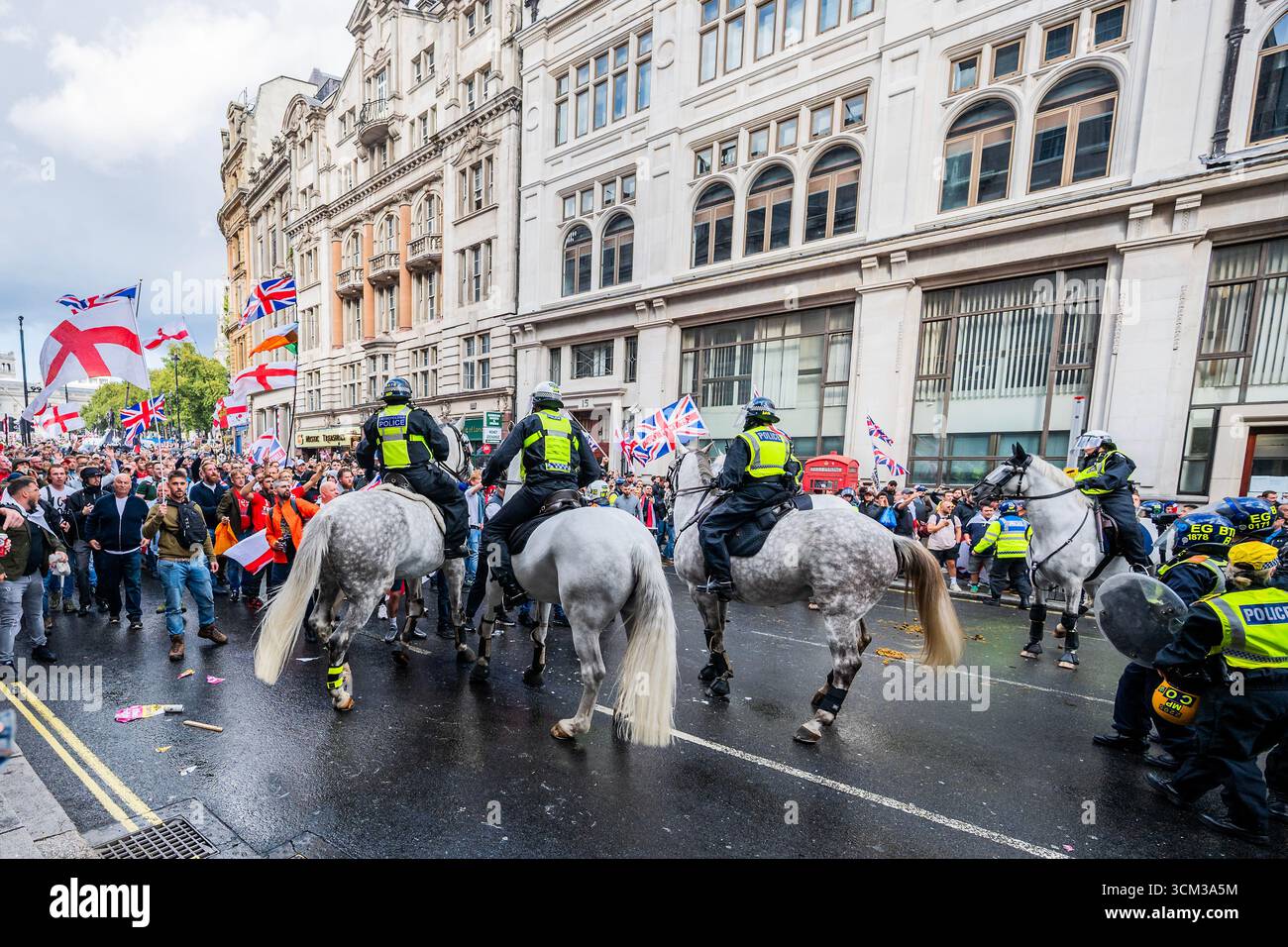 London, UK. 13 Sep 2025. After bottle throwing the police eventually ...