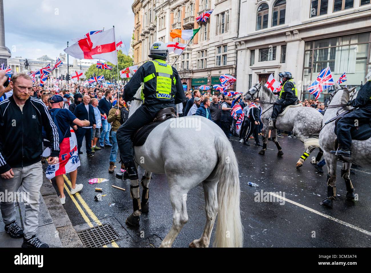 London, UK. 13 Sep 2025. After bottle throwing the police eventually ...