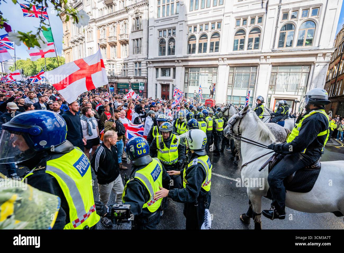 London, UK. 13 Sep 2025. After bottle throwing the police eventually ...
