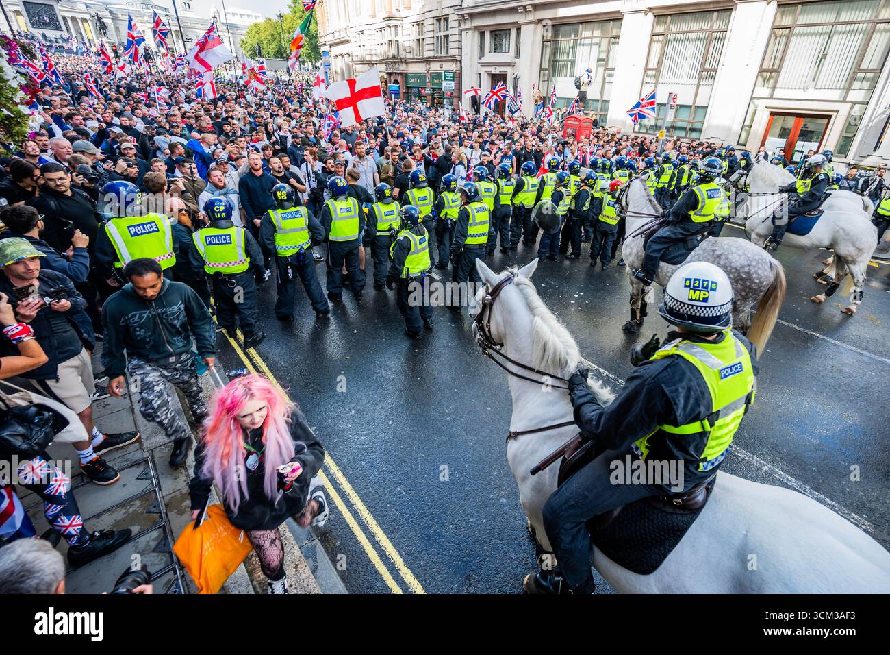 London, UK. 13 Sep 2025. After bottle throwing the police eventually ...