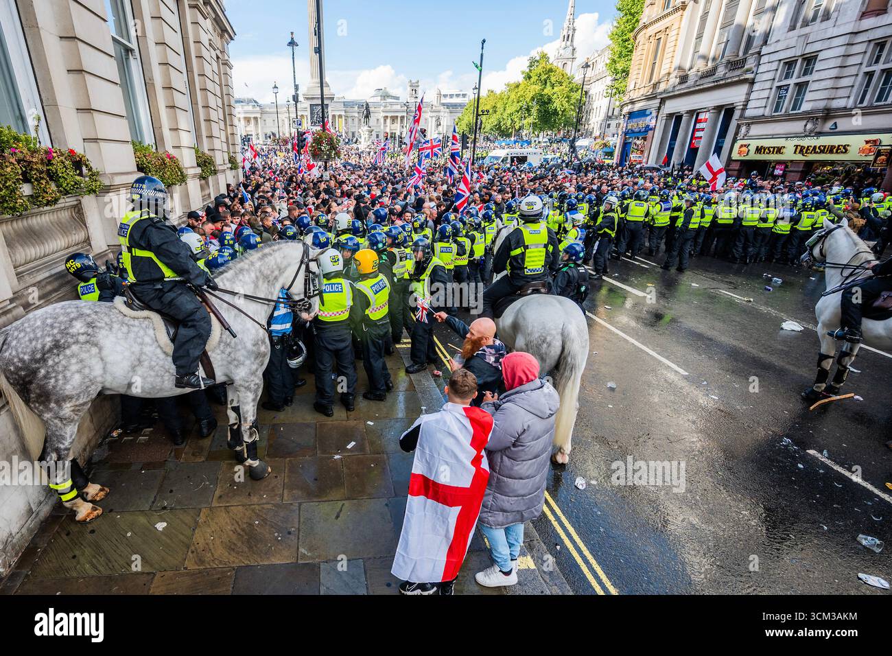 London, UK. 13 Sep 2025. After bottle throwing the police eventually ...