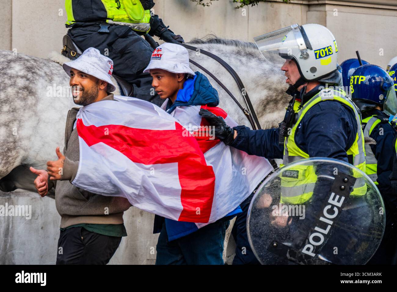 London, UK. 13 Sep 2025. After bottle throwing the police eventually ...