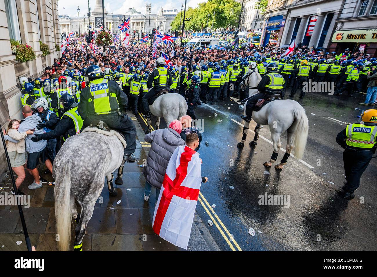 London, UK. 13th Sep, 2025. After bottle throwing the police eventually ...