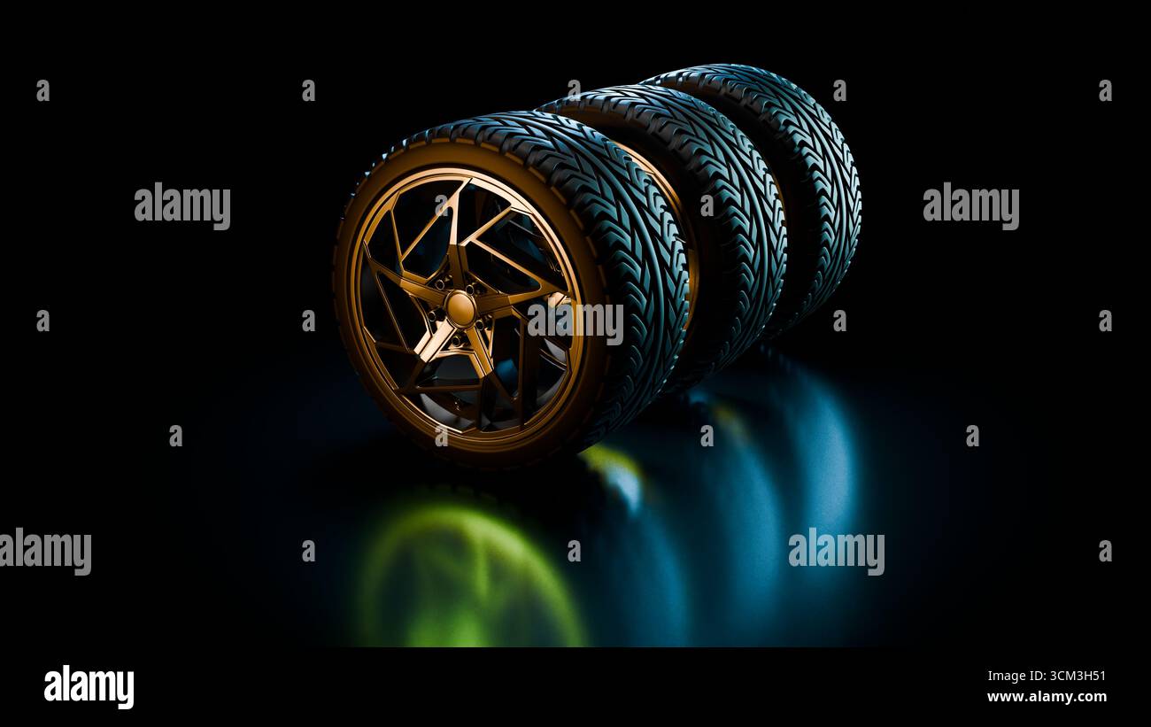 A neat stack of car wheels with golden alloy rims is placed on a shiny ...