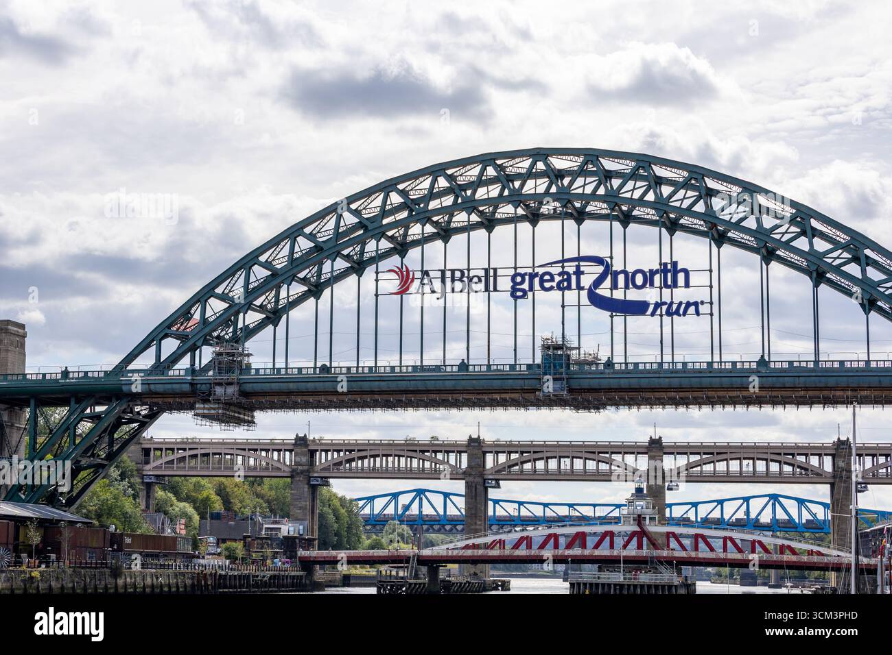 Multiple Brdiges A view of multiple bridges spanning a river, with the largest bridge in ...